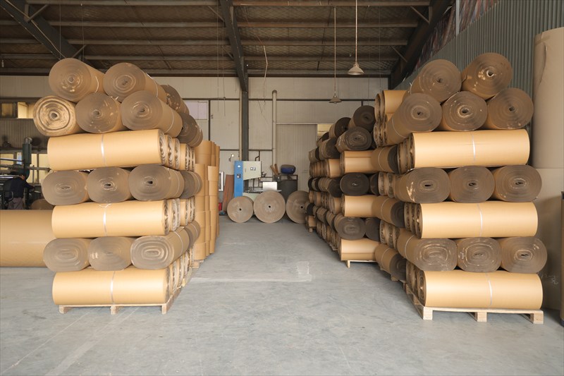 Customer photo of paper rolls neatly stored in the warehouse